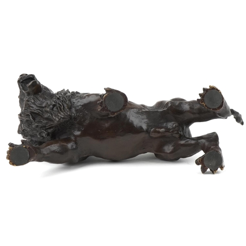 1072 - Large patinated bronze study of a lion, 31cm in length