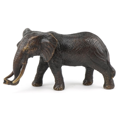 1209 - Japanese bronze okimono of a bull elephant, 30cm in length