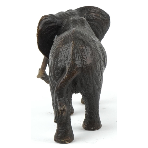 1209 - Japanese bronze okimono of a bull elephant, 30cm in length