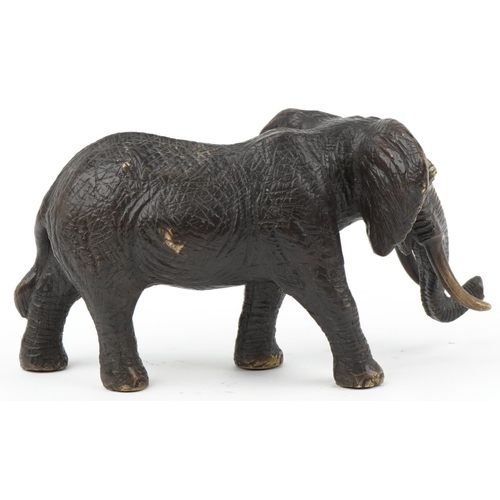 1209 - Japanese bronze okimono of a bull elephant, 30cm in length