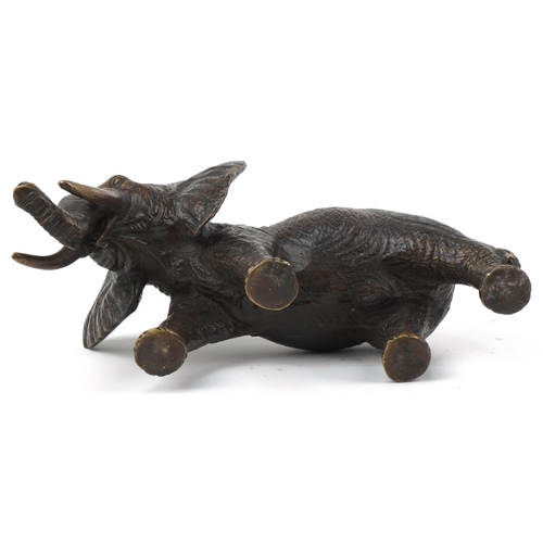 1209 - Japanese bronze okimono of a bull elephant, 30cm in length