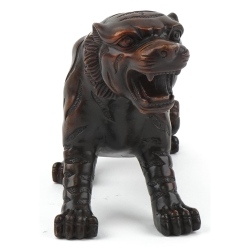 1115 - Japanese patinated bronze okimono figure of a tiger, 34cm in length