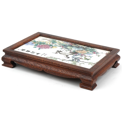 1357 - Chinese hardwood tray inset with a porcelain panel hand painted with cranes amongst flowers, 28cm wi... 