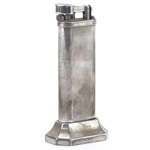 1008 - Dunhill, engine turned silver plated table lighter numbered 14939, 10cm high