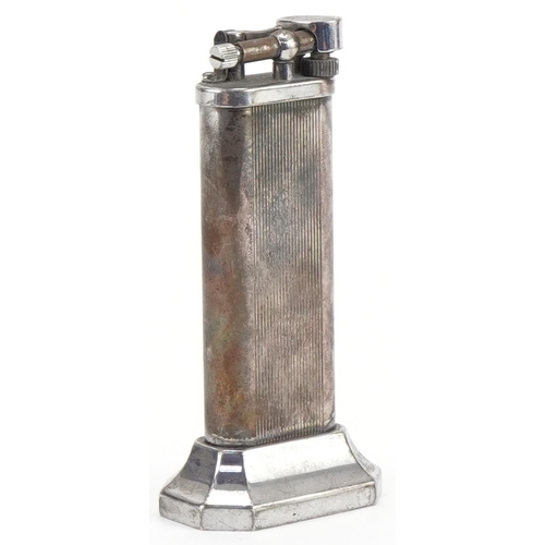 1008 - Dunhill, engine turned silver plated table lighter numbered 14939, 10cm high