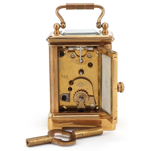 1092 - Miniature brass cased carriage clock with Sèvres type porcelain panels decorated with butterflies am... 