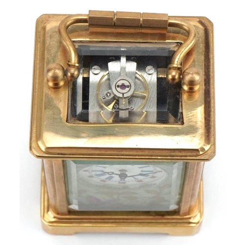 1092 - Miniature brass cased carriage clock with Sèvres type porcelain panels decorated with butterflies am... 