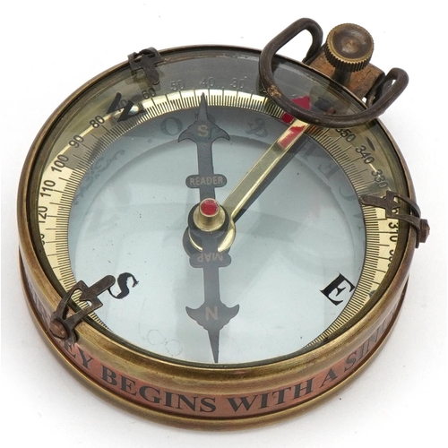 2180 - Naval interest brass compass housed in a mahogany case, 8cm in diameter