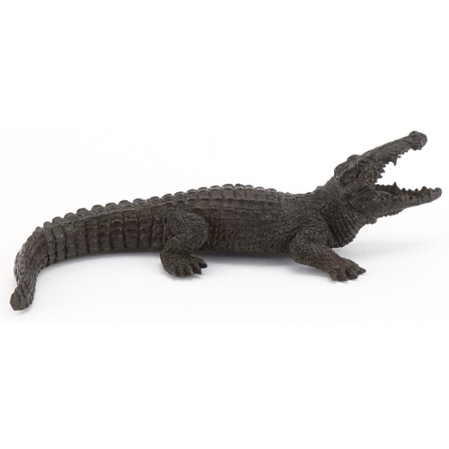 1309 - Japanese bronze okimono of a crocodile, impressed marks to the underside, 14cm in length