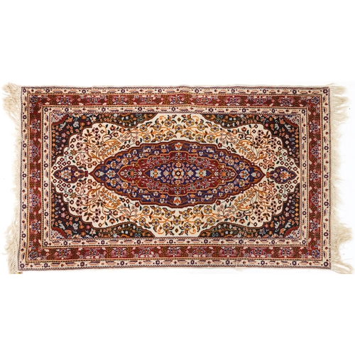 749 - Rectangular Middle Eastern part silk rug having an allover floral design onto a predominantly cream ... 