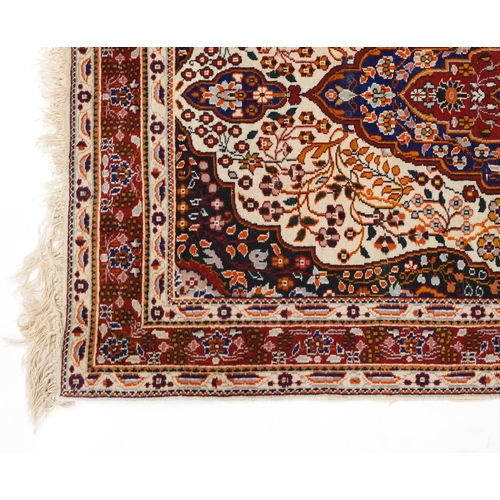 749 - Rectangular Middle Eastern part silk rug having an allover floral design onto a predominantly cream ... 