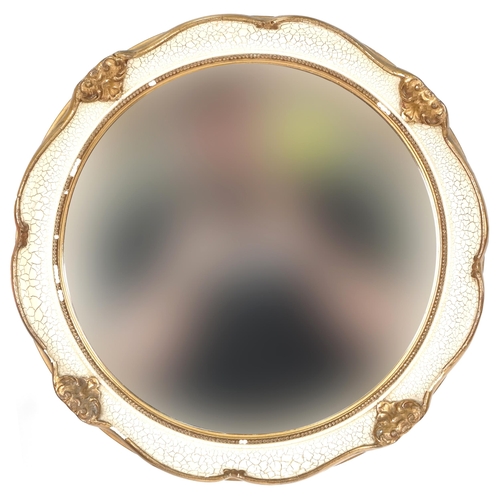 673 - Modern circular cream and gilt framed wall mirror, 38cm in diameter