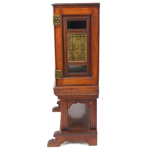 599 - Edwardian mahogany display cabinet on stand, the doors and sides each fitted with a brass panel depi... 