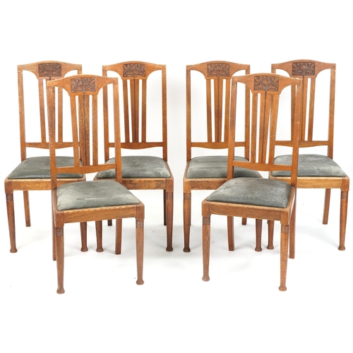 601 - Set of six early 20th century Arts & Crafts oak dining chairs with carved back rails above drop in s... 