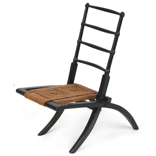 536 - Aesthetic Movement ebonised folding chair by E. W. Godwin, 71cm H x 37cm W x 66cm D