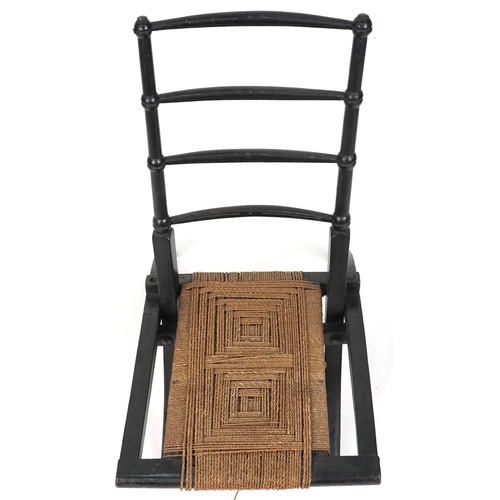 536 - Aesthetic Movement ebonised folding chair by E. W. Godwin, 71cm H x 37cm W x 66cm D