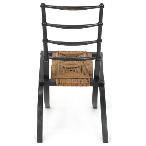 536 - Aesthetic Movement ebonised folding chair by E. W. Godwin, 71cm H x 37cm W x 66cm D