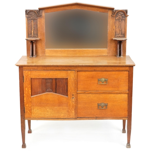 622 - Early 20th century Arts & Crafts oak mirrored back sideboard with 'Tree of Life' carved decoration, ... 