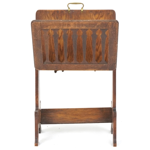 603 - George V Arts & Crafts style oak folio stand raised on shaped supports, 80cm H x 46cm W x 29cm D