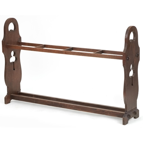 610 - Early 20th century oak four division stick stand, 78cm H x 125cm W x 26cm D