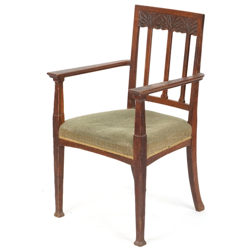 627 - Edwardian oak open armchair with carved decoration, 69cm H x 59cm W x 51cm D