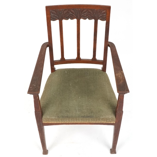 627 - Edwardian oak open armchair with carved decoration, 69cm H x 59cm W x 51cm D