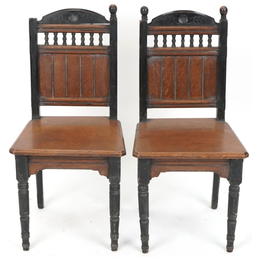 609 - Pair of late 19th century Gothic Revival oak and ebonised hall chairs, 94cm H x 45cm W x 43cm D