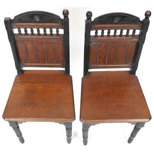 609 - Pair of late 19th century Gothic Revival oak and ebonised hall chairs, 94cm H x 45cm W x 43cm D