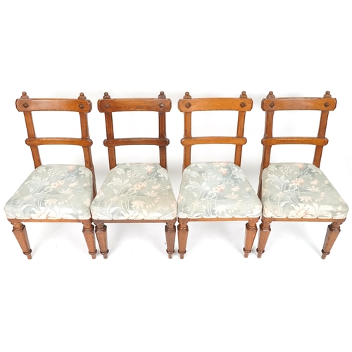 608 - Set of four early 20th century Gothic revival oak dining chairs with overstuffed seats, 91cm H x 47c... 