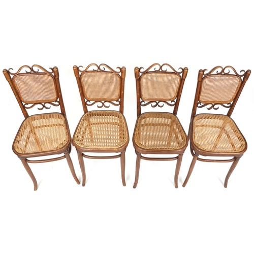 542 - Set of four early 20th century bentwood beech framed chairs by Josef Hoffmann, each bearing a paper ... 