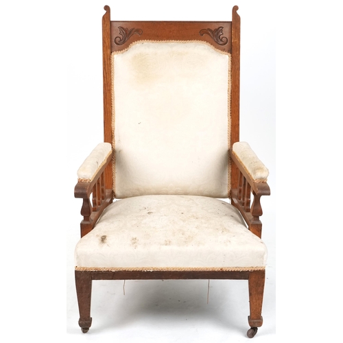 630 - Edwardian Arts & Crafts gentlemen's oak salon armchair with carved decoration, 112cm H x 70cm W x 68... 