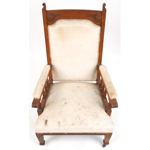 630 - Edwardian Arts & Crafts gentlemen's oak salon armchair with carved decoration, 112cm H x 70cm W x 68... 