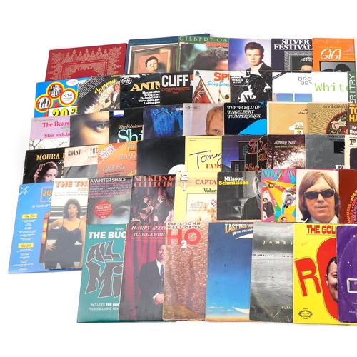 1500 - Vinyl LP records including Kool & The Gang, The Barron Knights, The Jukes, The Hollies, Paul Simon, ... 