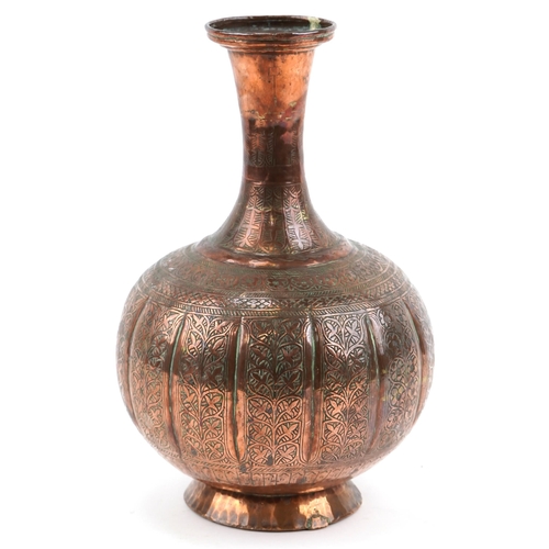 1326 - Middle Eastern copper vase profusely engraved with foliage, 32cm high