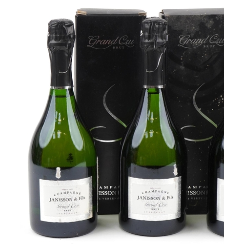 2006 - Four bottles of Champagne with boxes comprising three bottles of Janisson & Fils Grand Cru Brut and ... 