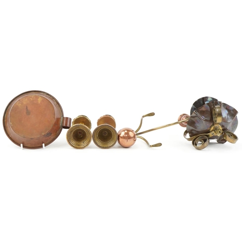 26 - Christopher Dresser Arts & Crafts copper and brass candlesticks and a brass chamberstick, the larges... 