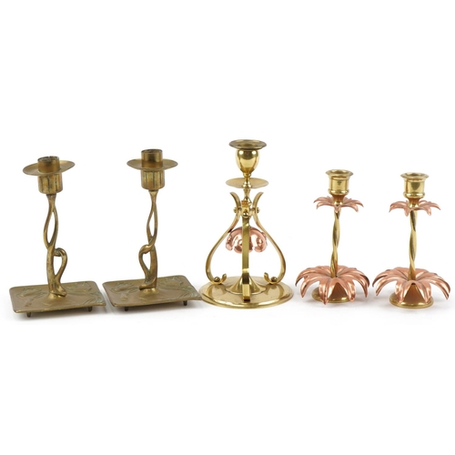 27 - Arts & Crafts brass and copper candlesticks including a W.A.S Benson example, the largest 20cm high