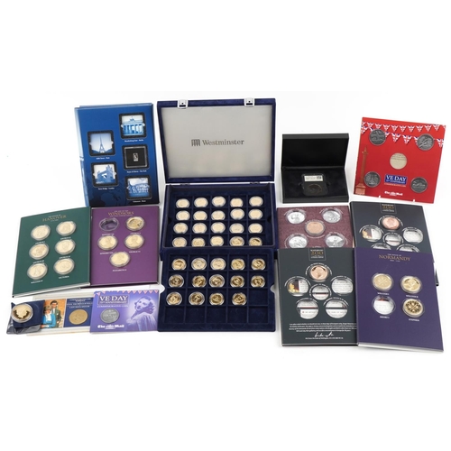 2440 - Commemorative coins and medallions including a New York Statue of Liberty fine silver ingot, proof q... 