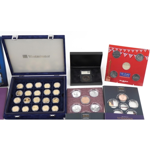 2440 - Commemorative coins and medallions including a New York Statue of Liberty fine silver ingot, proof q... 