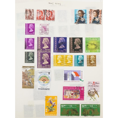 2470 - Five stamp albums containing British Commonwealth and world stamps