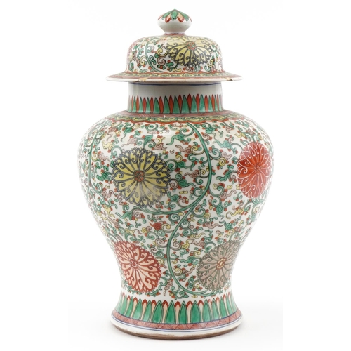 1178 - Large Chinese porcelain baluster vase and cover hand painted with flowers and foliage, 40cm high