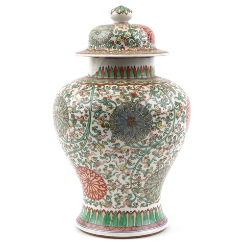 1178 - Large Chinese porcelain baluster vase and cover hand painted with flowers and foliage, 40cm high