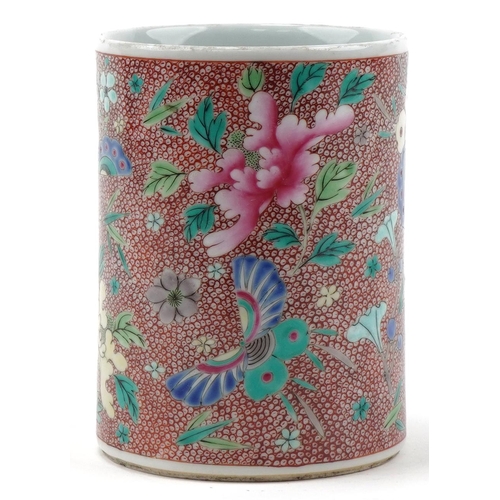 1015 - Chinese porcelain cylindrical brush pot hand painted with butterflies and flowers, 13.5cm high