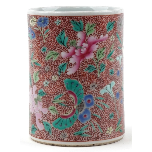 1015 - Chinese porcelain cylindrical brush pot hand painted with butterflies and flowers, 13.5cm high