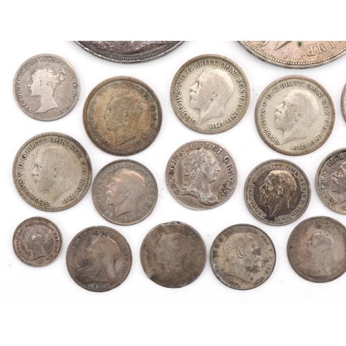 2408 - British 19th/20th century silver coinage including six crowns dates 1821, 1887, 1890, 1896, two Geor... 