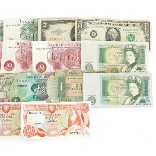 2459 - British and world banknotes including old five pound note and USA one and two dollars