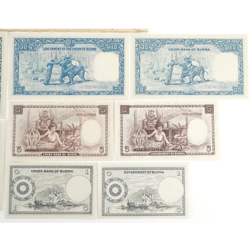 2453 - Burmese unissued banknotes, possibly proof, each banknote cancelled with a punch, serial numbers on ... 