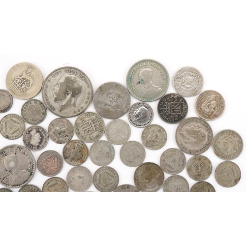 2404 - British and world silver and white metal coinage including 1923 half crown, total weight 145g