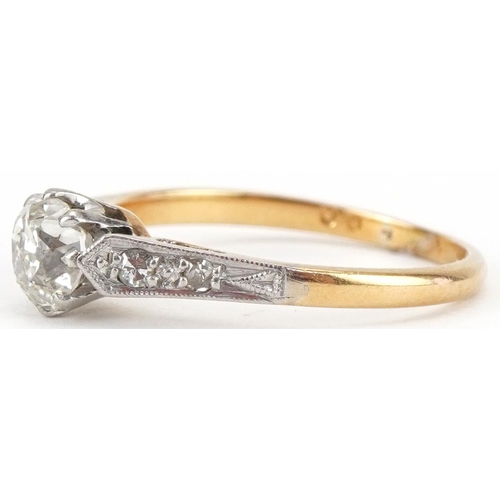 3098 - 18ct gold diamond solitaire ring with diamond set shoulders, the diamond approximately 5.10mm x 4.50... 