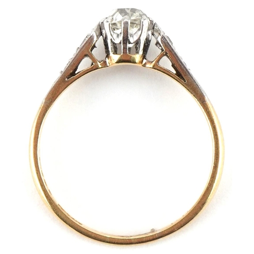 3098 - 18ct gold diamond solitaire ring with diamond set shoulders, the diamond approximately 5.10mm x 4.50... 